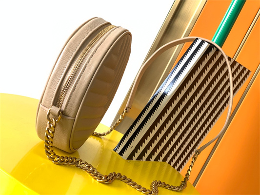 Y.S.L VINYLE ROUND CAMERA BAG IN Beige Chevron Quilted Grain De Poudre Embossed Leather Gold Tone Metal