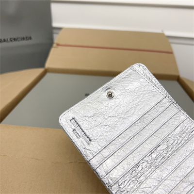 Le Cagole Compact Zippy Wallet In Metallized Arena Lambskin Silver Color