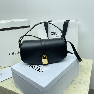 Ce**e clutch on strap tabou in smooth calfskin black