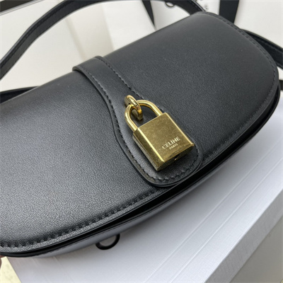 Ce**e clutch on strap tabou in smooth calfskin black