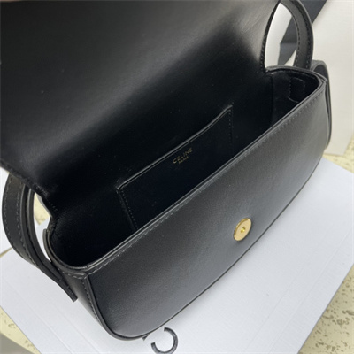 Ce**e clutch on strap tabou in smooth calfskin black