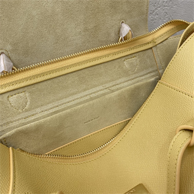 Ce**e micro belt bag in yellow grained calfskin