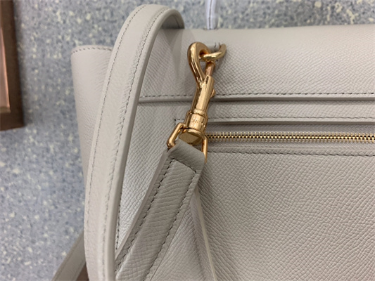 Ce**e micro belt bag in cream grained calfskin