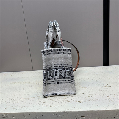 Ce**e small cabas thais in striped textile with Ce**e jacquard and calfskin