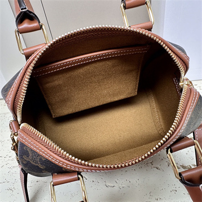 Ce**e small boston bag in triomphe canvas and calfskin tan