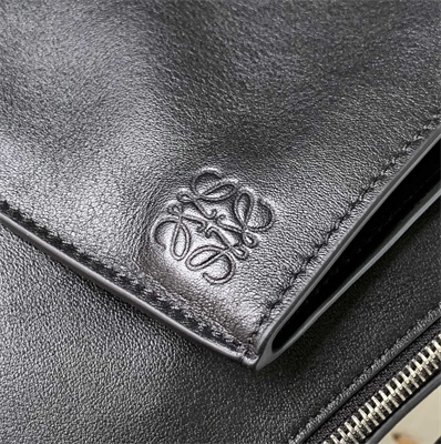 l0ew* anton sling bag in S*pple smooth calf and jacquard