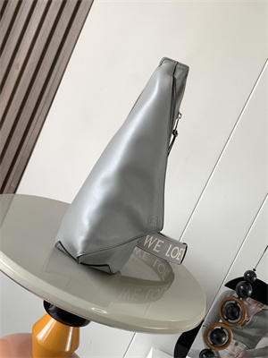 l0ew* anton sling bag in S*pple smooth calf and jacquard