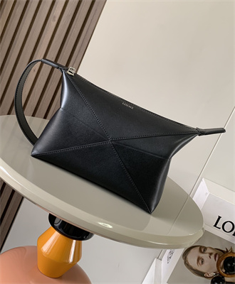 L0ew* puzzle fold wash bag in shiny calfskin