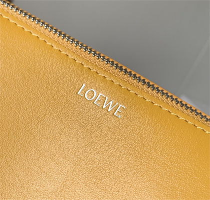 L0ew* puzzle fold wash bag in shiny calfskin