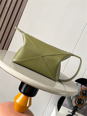 L0ew* puzzle fold wash bag in shinny calfskin
