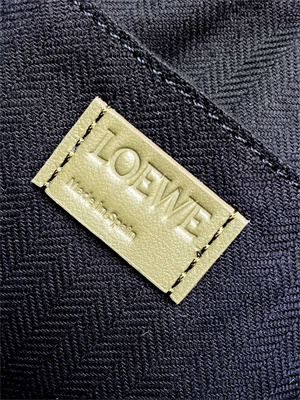 L0ew* puzzle fold wash bag in shinny calfskin