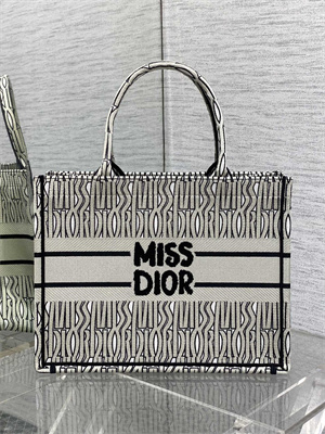 cd miss D*or medium book tote allover emb green