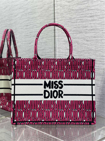 cd miss D*or medium book tote allover emb fuchsia