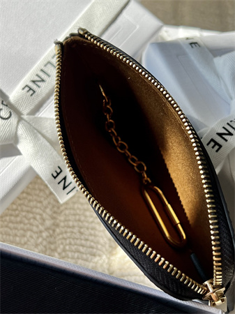 Ce**e coin purse with printing in triomphe canvas