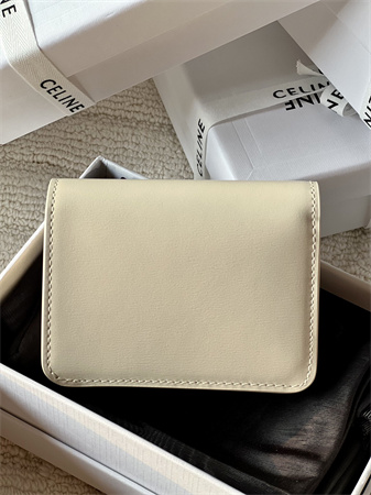 Ce**e triomphe compact wallet in shiny calfskin cream