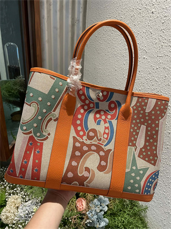 Her.mes  Garden Party 36CM Togo Leather and Graffiti Canvas HS