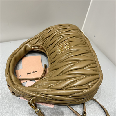 M*um*u wander matelassé nappa leather small hobo bag caramel color
