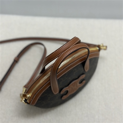 Ce**e oval bag in triomphe canvas and calfskin