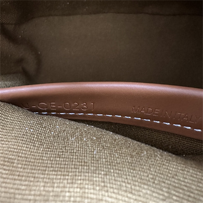 Ce**e oval bag in triomphe canvas and calfskin