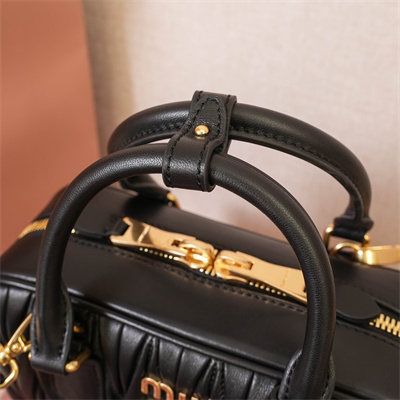 M*um*u arcadie matelassé nappa leather top handle bag black color