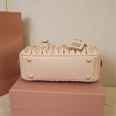 M*um*u arcadie matelassé nappa leather top handle bag pale pink color