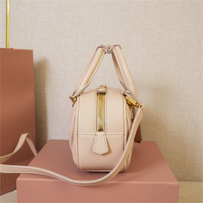 M*um*u arcadie matelassé nappa leather top handle bag pale pink color